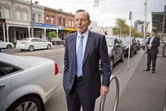 Prime Minister Tony Abbott leaves Triple M's studios on Clarendon Street, South Melbourne (Herald Sun).
